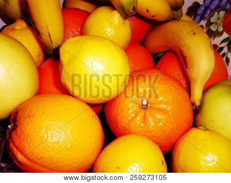 Bodegon Of Oranges, Apples, Bananas And Lemons