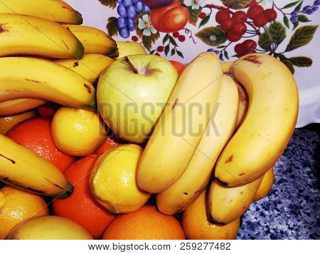 Bodegon Of Oranges, Apples, Bananas And Lemons