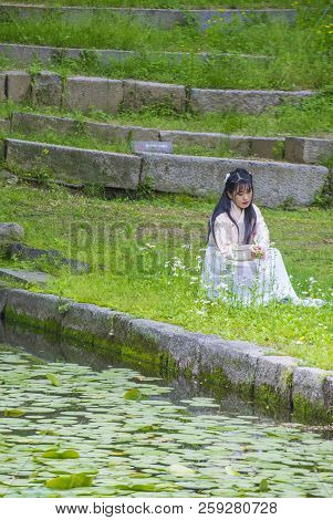 Seoul - May 10 : Korean Woman Wearing Hanbok Dress In Seoul Korea On May 10 2018. Hanbok Is A Korean
