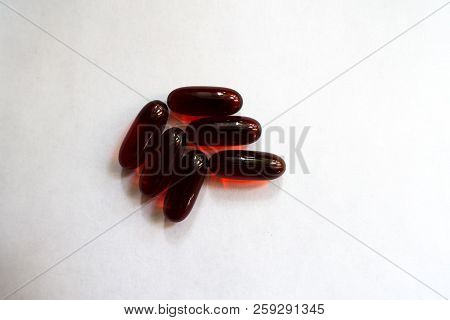 Dark Red Capsules Of Krill Oil (six Items)