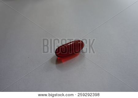 One Red Softgel Capsule Of Krill Oil