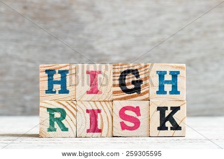 Letter Block In Word High Risk On Wood Background