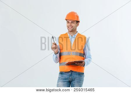 Civil Engineer Or Architech And Worker With Safety Helmet Checking Building , Engineering And Archit