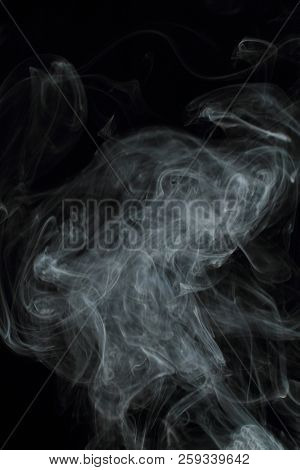 Abstract White Smoke Texture On Black Background