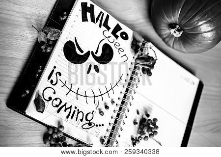 Halloween. Spooky And Horrible Painted With Black Marker In The Office Notebook Jack Skellington Wai