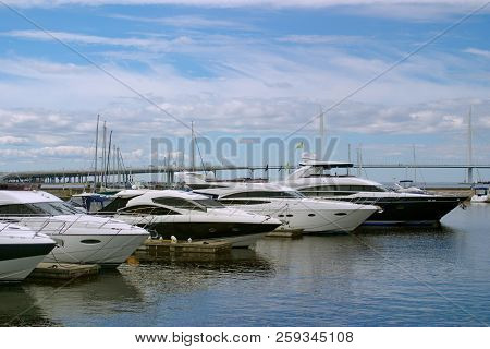 Motor Yachts Are Moored In The Harbor Of The Yacht Club On The Malaya Nevka River. Saint-petersburg.