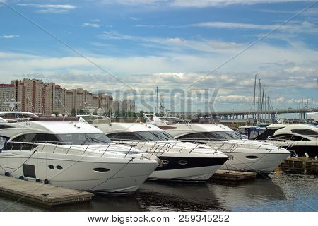 Motor Yachts Are Moored In The Harbor Of The Yacht Club On The Malaya Nevka River. Saint-petersburg.
