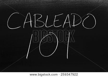The Words Cableado 101 On A Blackboard In Chalk.  Translation: Wiring 101