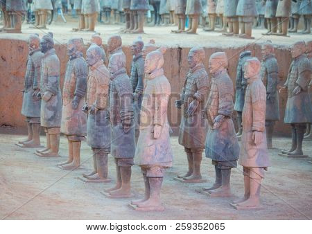 XIAN, CHINA - October 8, 2017: Famous Terracotta Army in Xi'an, China. The mausoleum of Qin Shi Huang,the first Emperor of China contains collection of terracotta sculptures of armored men and horses.