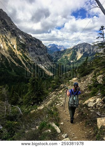 Hiking The Rocky Terrain Of The Crypt Lake Trail, A Steep Ascent To Crypt Lake Including Walking A L