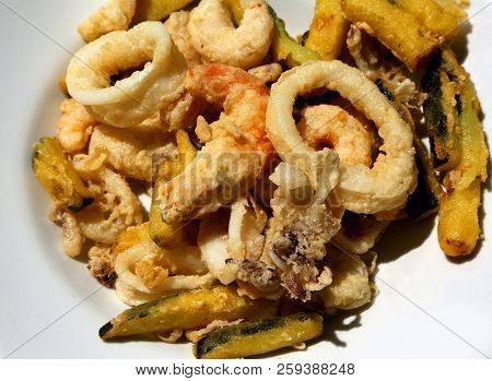 Deep Fried Fish And Battered Vegetables On The Dish