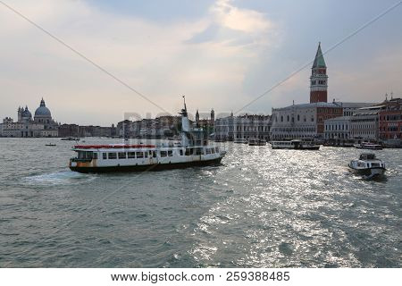 Skyline Of Venice In Italy Form The Boat And The High Bell Tower Of Saint Mark