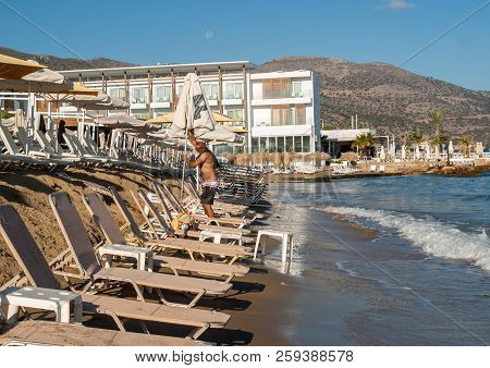 Malia. Crete, Greece - July 1, 2018: Sunbeds At The Beach In Malia On Crete, Greece