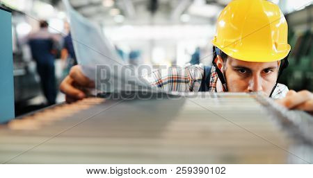 Supervisor Doing Quality Control And Pruduction Check In Factory