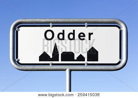 Odder City Road Sign On A Pole In Denmark
