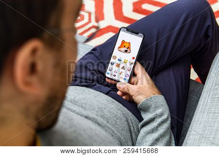 London, Uk - Sep 21, 2018: Man Using The New Fox Ar Memoji Emoji Face On Apple Iphone Xs With The Im