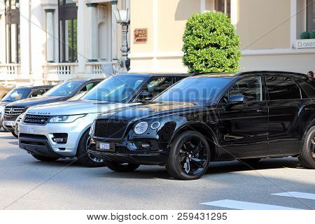 Monte-carlo, Monaco - September 19 2018 : Two Luxurious Suvs Parked In Front Of Monte Carlo Casino I