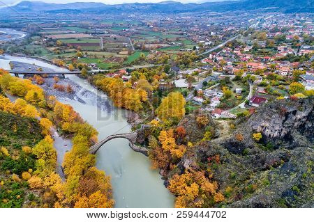 Aerial View Of Konitsa Old Bridge And Aoos River An Autumn Day, Greece.