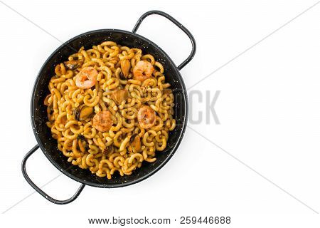 Traditional Spanish Fideua. Noodle Paella Isolated On White Background. Top View. Copyspace