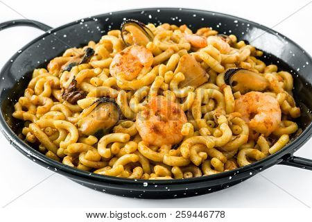 Traditional Spanish Fideua. Noodle Paella Isolated On White Background. Close Up