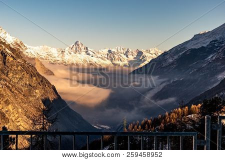 A Fantastic Valley Overlook With The Alpine Glow In The Background