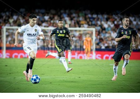 VALENCIA, SPAIN - SETEMBER 19: Carlos Soler with ball during UEFA Champions League match between Valencia CF and Juventus at Mestalla Stadium on September 19, 2018 in Valencia, Spain