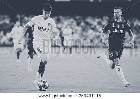 VALENCIA, SPAIN - SETEMBER 19: Carlos Soler with ball during UEFA Champions League match between Valencia CF and Juventus at Mestalla Stadium on September 19, 2018 in Valencia, Spain