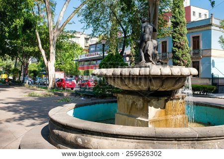 MEXICO CITY - JULY 18,2018 : Alvaro Obregon avenue at the fashionable Roma Norte neighborhood in Mexico City
