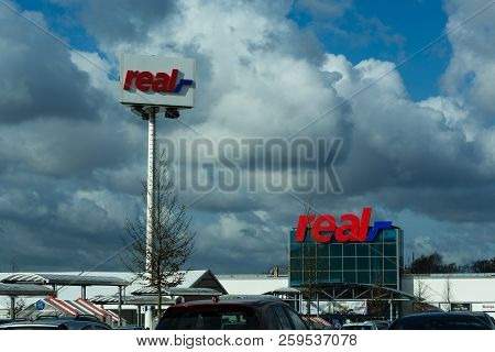 Heiligenhaus, Nrw, Germany - February 24, 2017: Real Logo On Department Store In Heiligenhaus In Fro