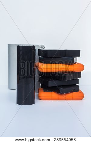 Different Kinds Of External Computer Storage Hard Drives - Isolated On White Background