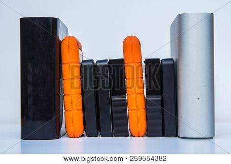 Different Kinds Of External Computer Storage Hard Drives - Isolated On White Background