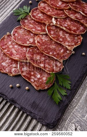 Saucisson Sec Delicious French Salami On A Wooden Background