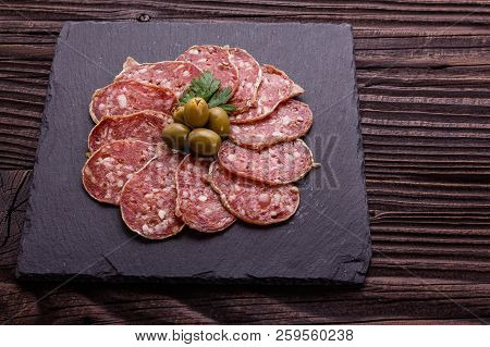 Saucisson Sec Delicious French Salami On A Wooden Background