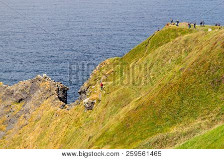 People Over Cliffs Of Moher