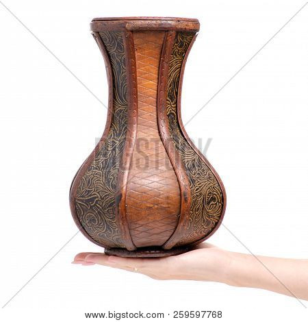 Wooden Vase In Hand On White Background Isolation