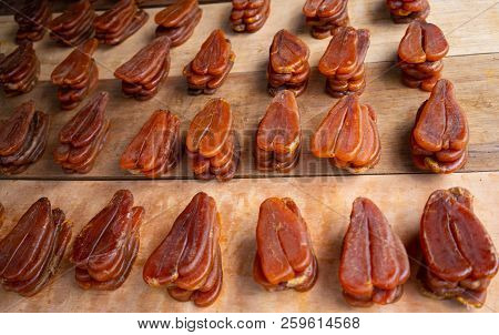 Karasumi Mullet Roe Drying Outside On A Market Stand In Taiwan