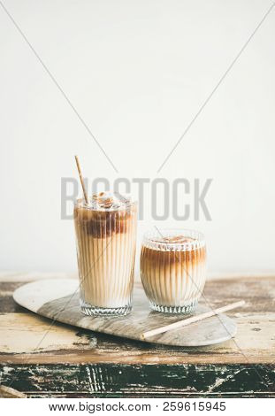 Iced Coffee Drink In Tall Glasses On Board, Copy Space