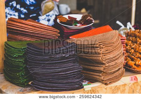 Tklapi - Traditional Georgian Fruit Pastila Selling At Market.
