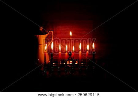 Hanukkah Is A Jewish Holiday. Burning Chanukah Candlestick With Candles. Jug Of Oil. Chanukiah Menor