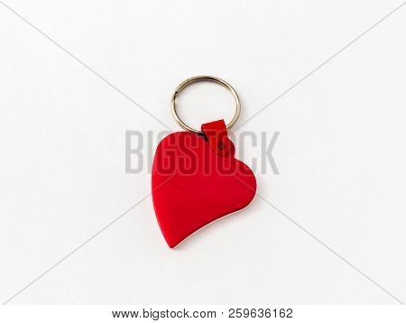 Plastic Key Ring Breloque In The Shape Of A Red Heart Isolated On A White Background