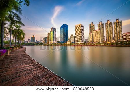Bangkok, Thailand - March 30, 2018 : Lake Ratchada Situated In The Benjakitti Park With Modern High 
