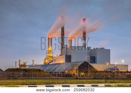 Coal Powered Electicity Power Plant In Europoort Area With Coal Supply In Foreground, Maasvlakte Rot