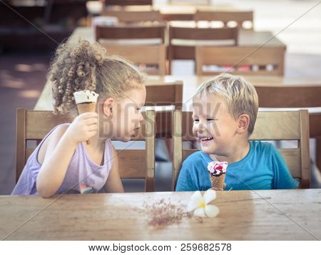 Cute kids are eating ice cream 
