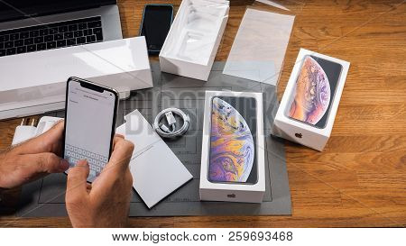 Paris, France - September 21, 2018: Apple Fan Boy Unboxing Latest New Apple Iphone Xs Max And Xs Fla
