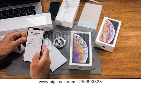 Paris, France - September 21, 2018: Apple Fan Boy Unboxing Latest New Apple Iphone Xs Max And Xs Fla