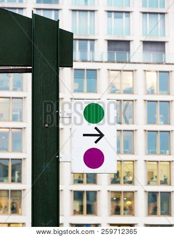 Street Sign With Copyspace Under The Rain In Berlin, Germany