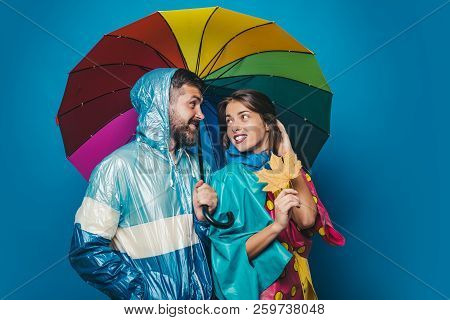 Happy Couple In Love Wearing In Autumn Clothes On Autumn Rain Day. Autumn Mood And The Weather Are R