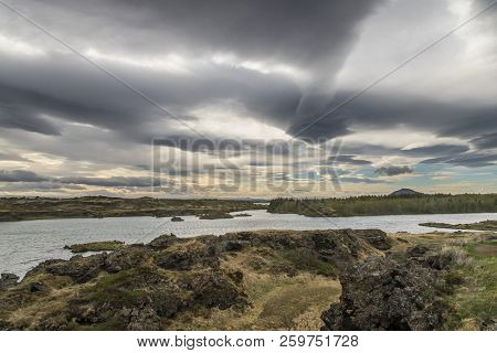 View Of Höfði, Iceland With A Crazy, Colorful Sky With Interesting Cloud Formations
