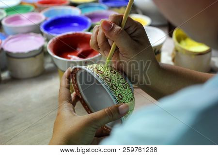 Artist Painting Benjarong Ceramic Ware
