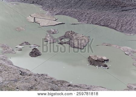 Glacier Lake At The Pasterze Glacier In The Austrian Alps.